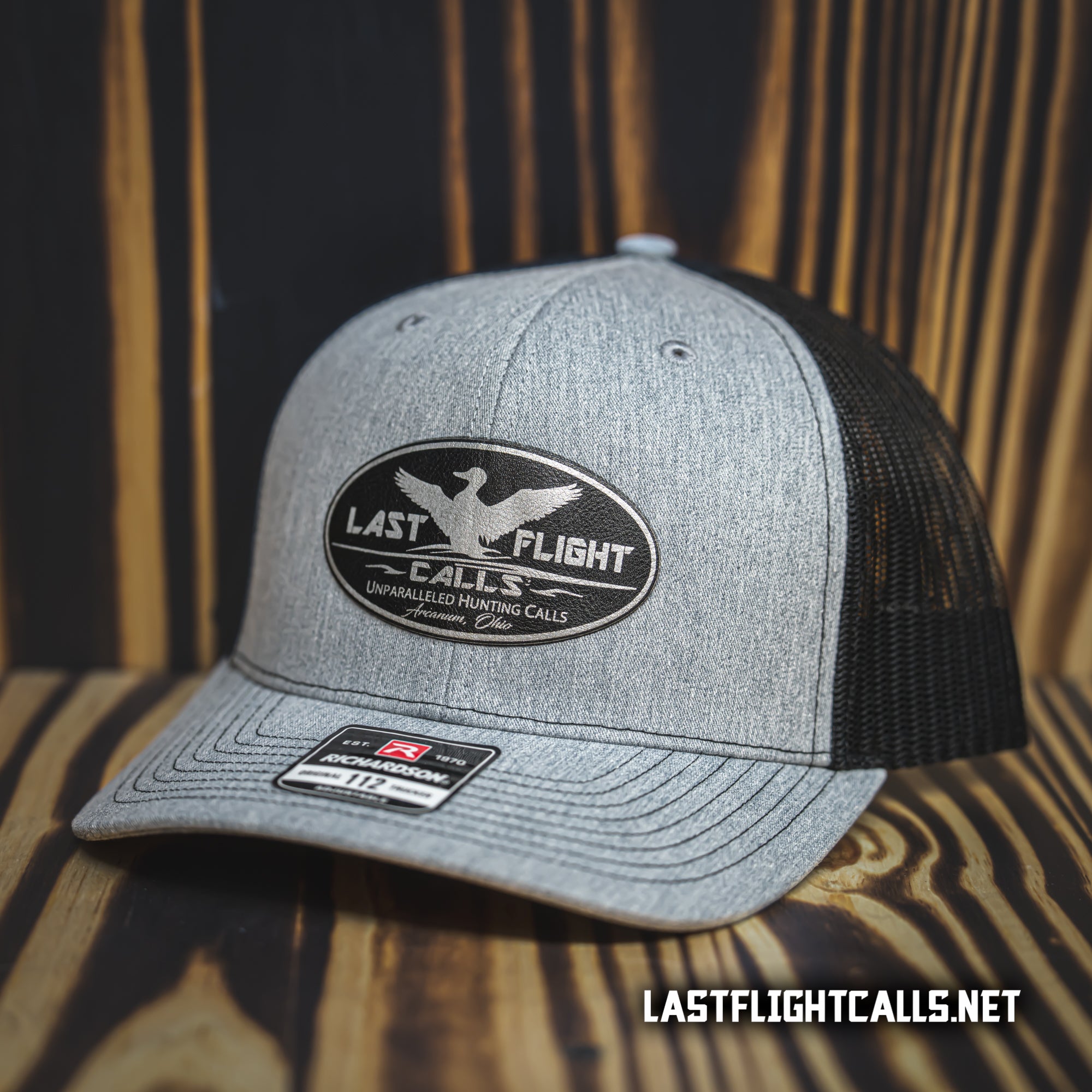 "GREY/BLACK” LOGO 112 TRUCKER HAT