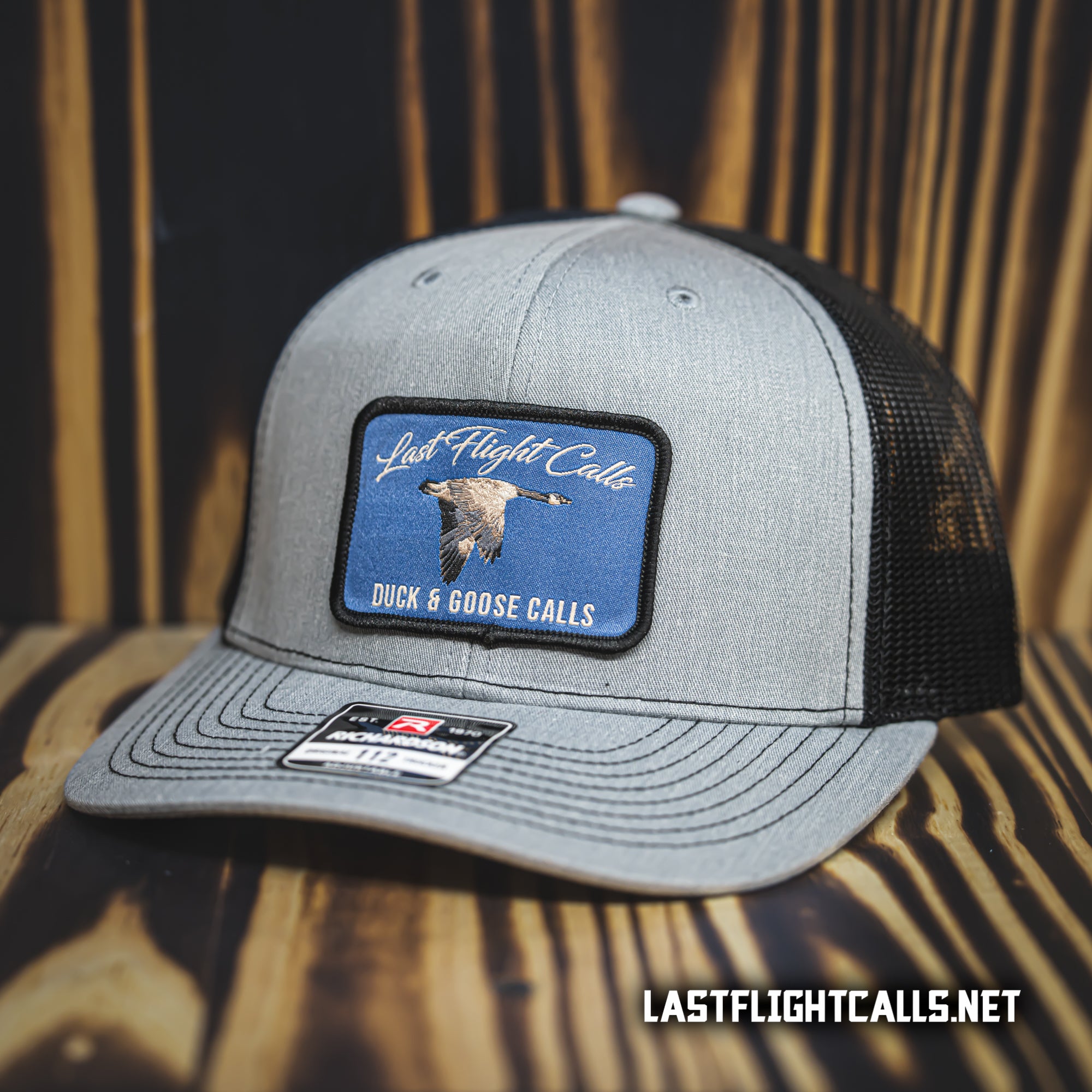 "GREY/BLACK” GOOSE 112 TRUCKER HAT